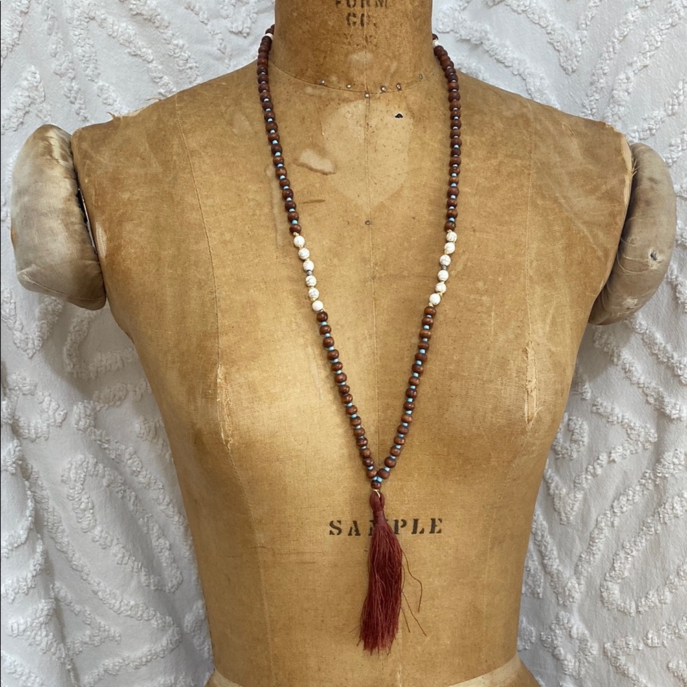Elegant Brown and White Beaded Necklace with Tassel